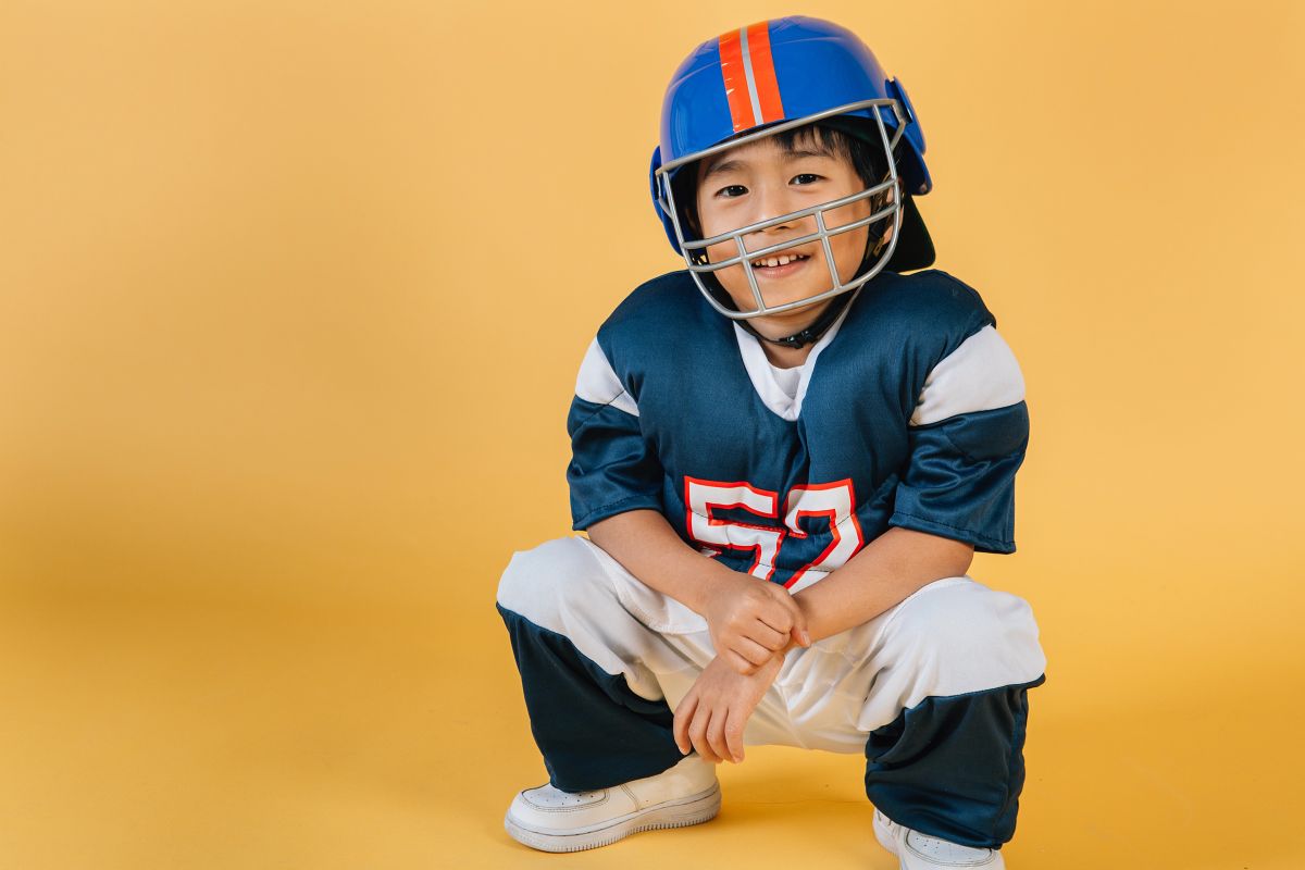 Child In football gear