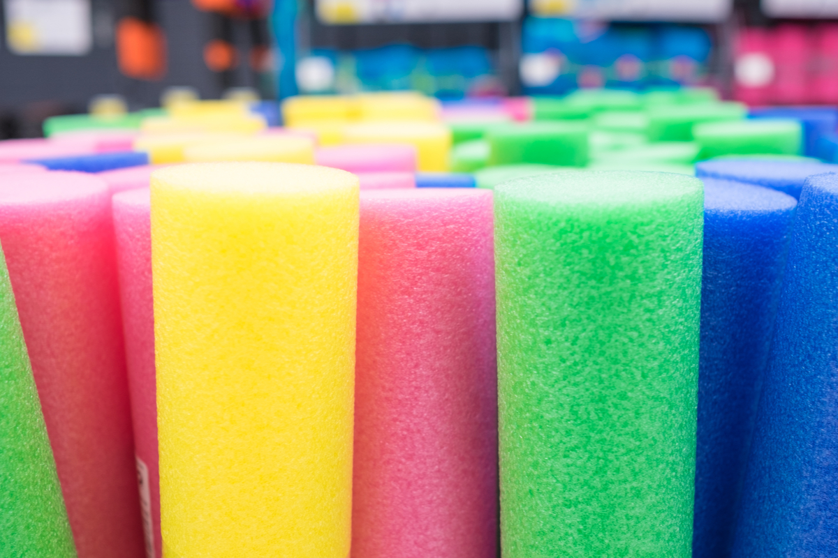 Rows of colored pool noodles