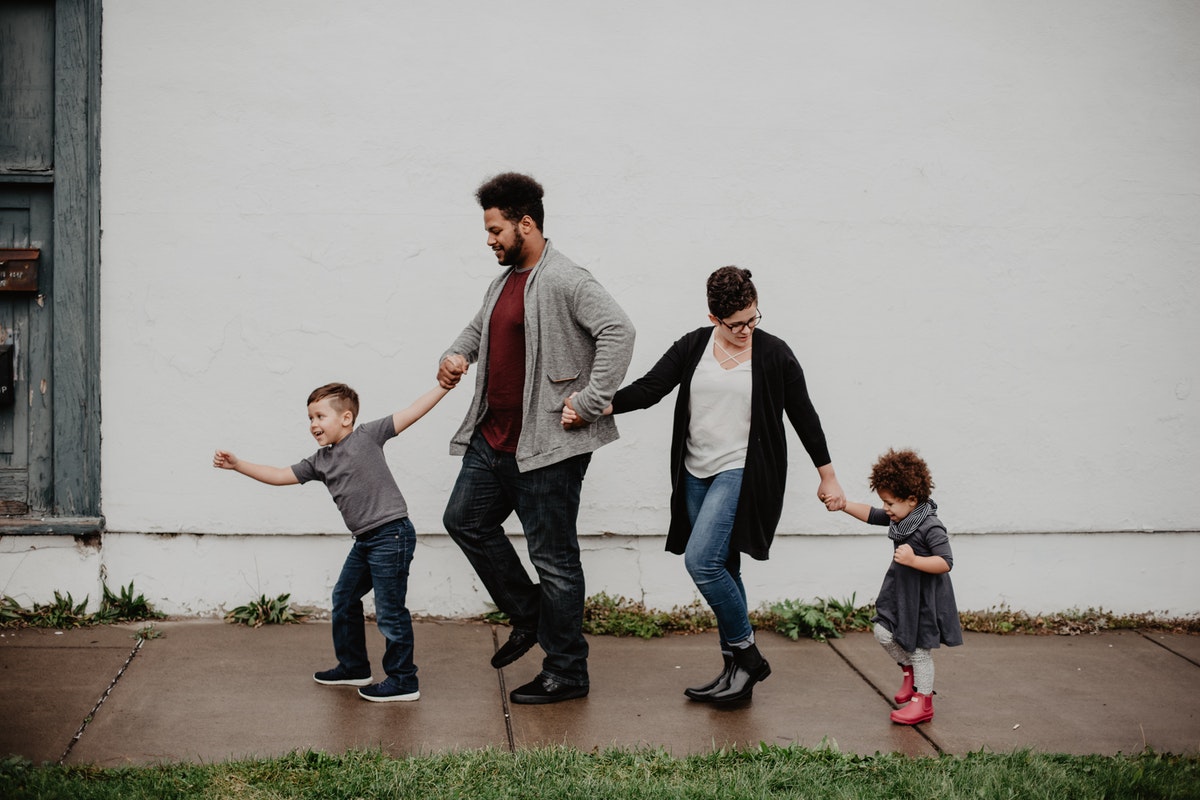 Family having fun walking outside