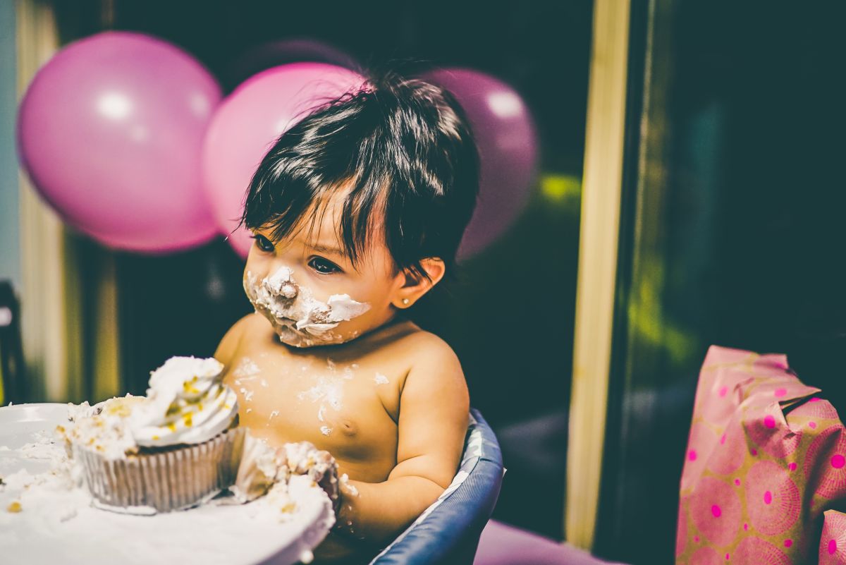 A Baby With Smashed Cake