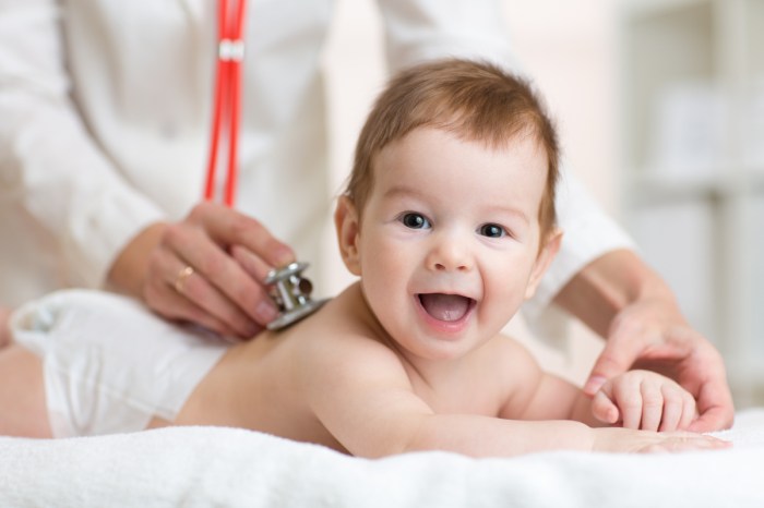 A happy baby gets a checkup