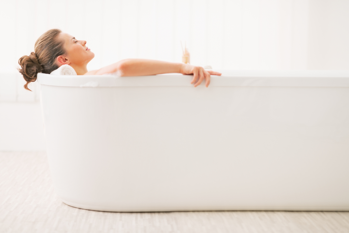 A new mom relaxes in the tub