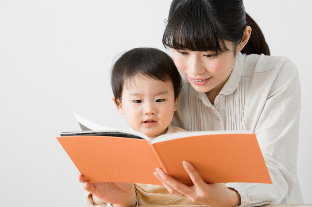 A mother and daughter reading together