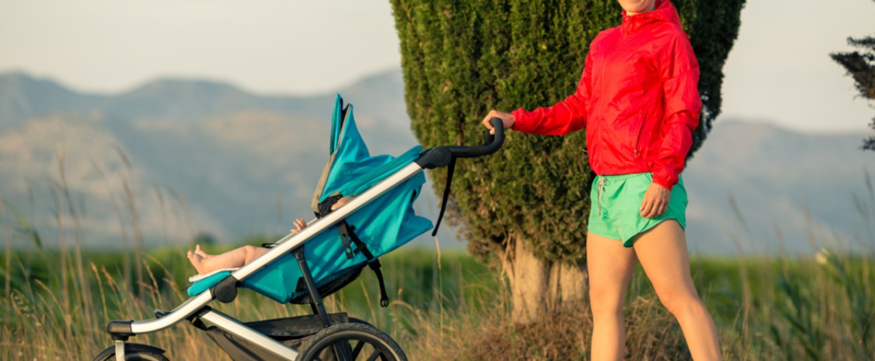 A woman, baby and running stroller