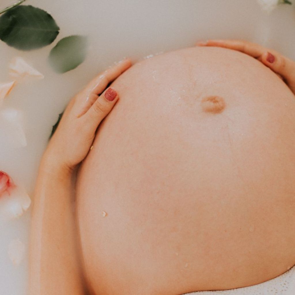 Pregnant woman in a bathtub