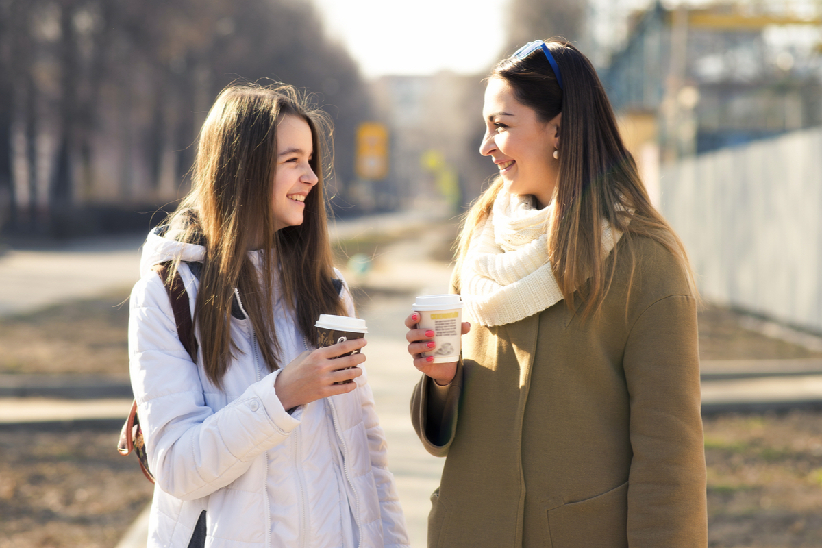 Teen and mom having coffee.