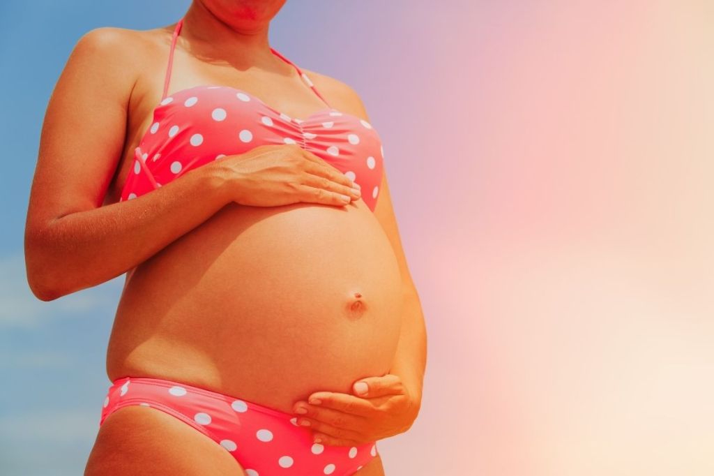 Pregnant woman at the beach