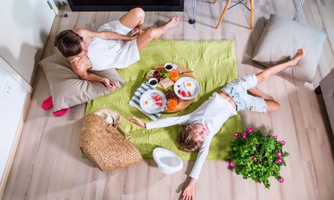 Mom and son having a picnic at home