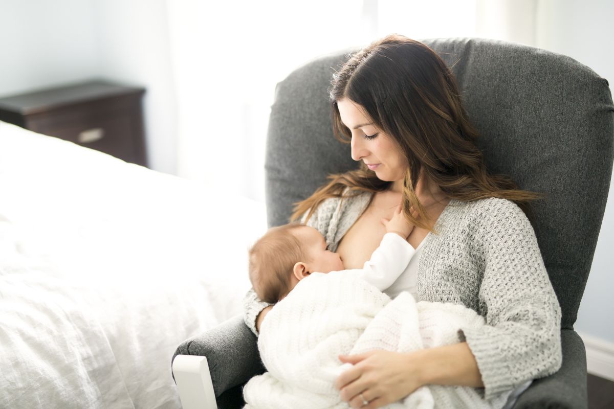A mom and baby breastfeeding