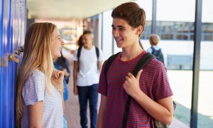 Two teenagers talking.