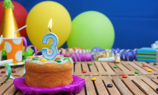 Birthday cake with a number 3 candle on it
