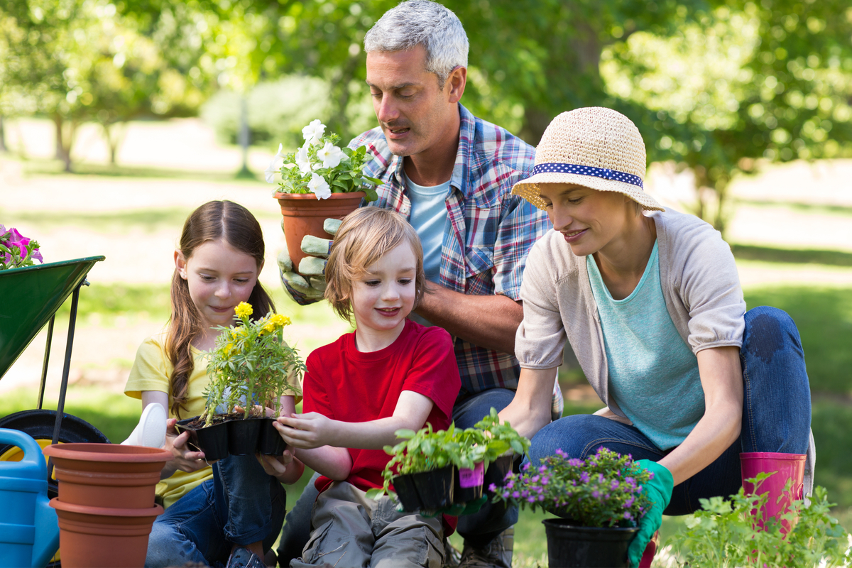 family having fun gardening on Mother's Day