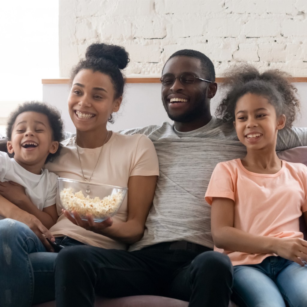 Family watching a movie together on Mother's Day on Mother's Day