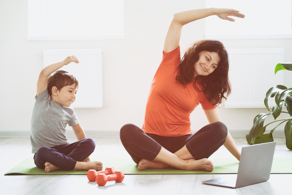 Mom and son doing an online workout.