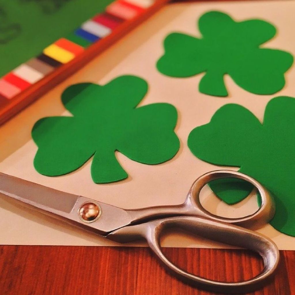 Cut-out shamrocks on a table