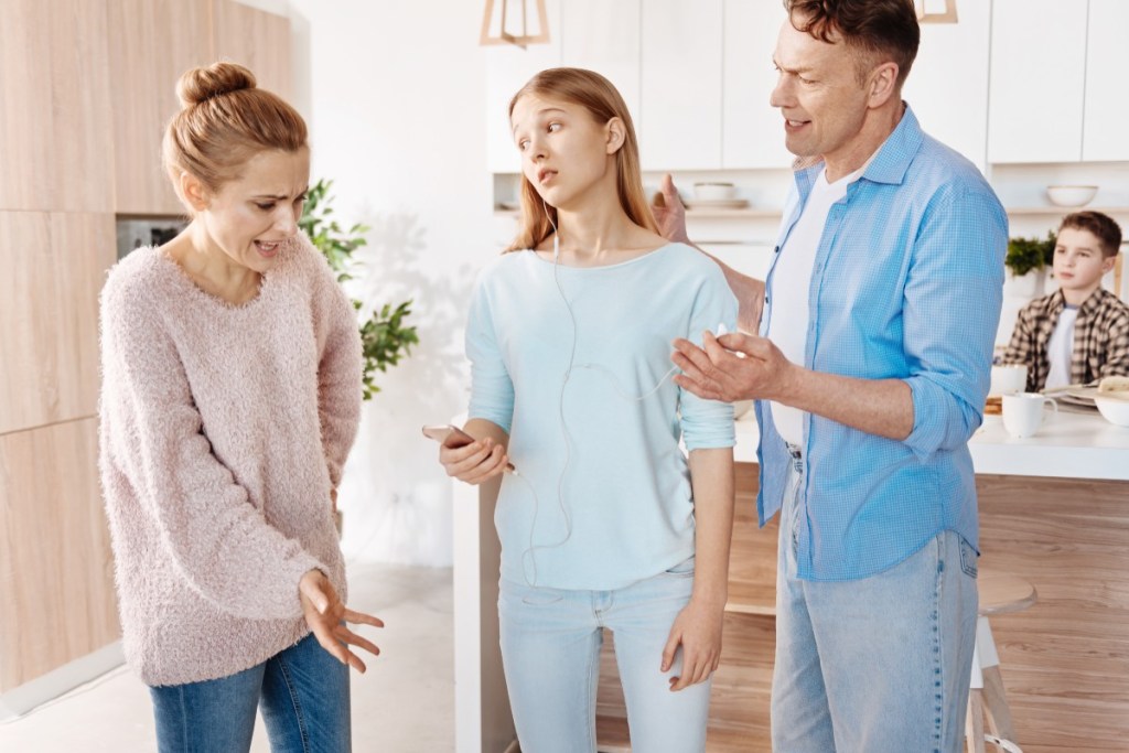 Teenage girl fighting with parents