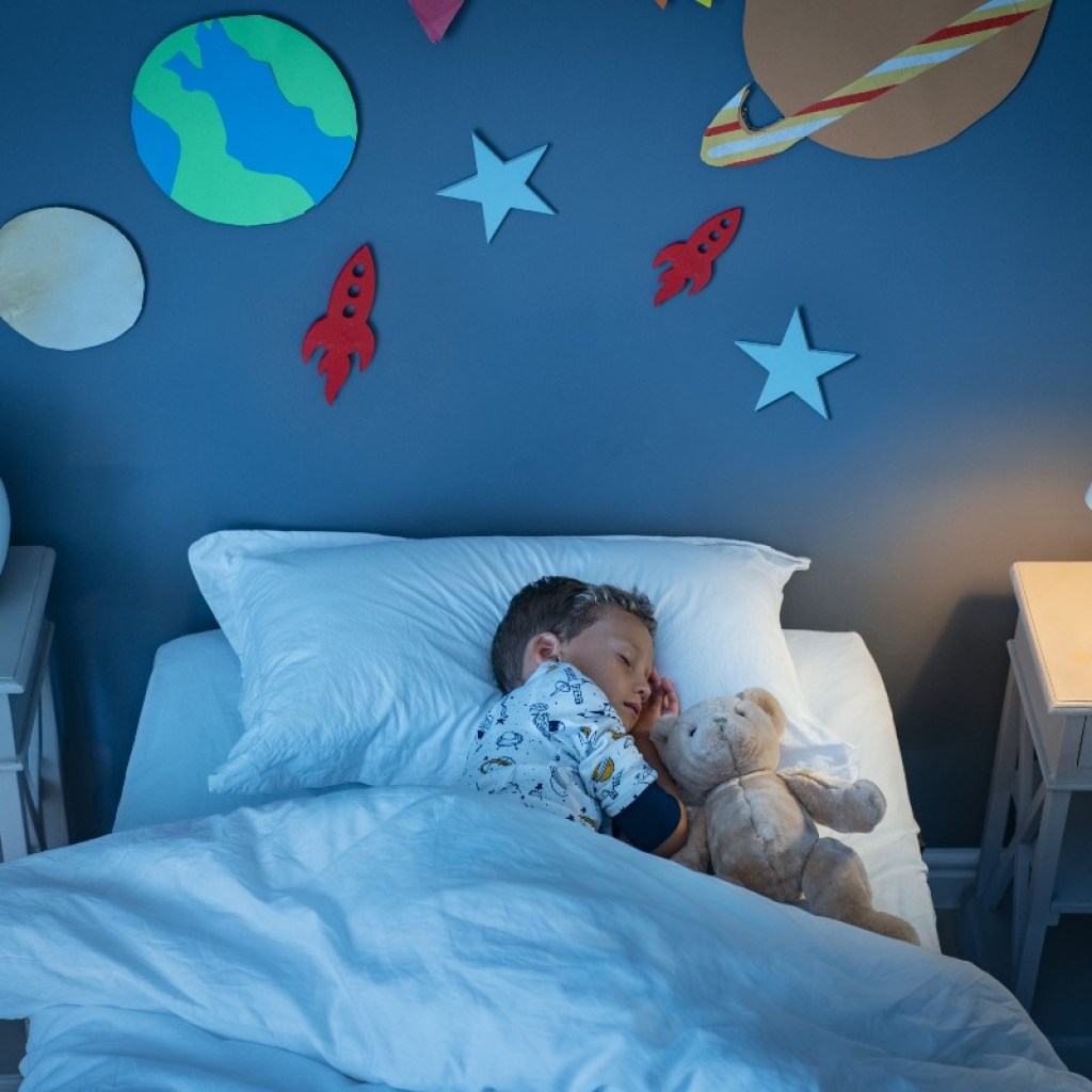 boy sleeping in bedroom