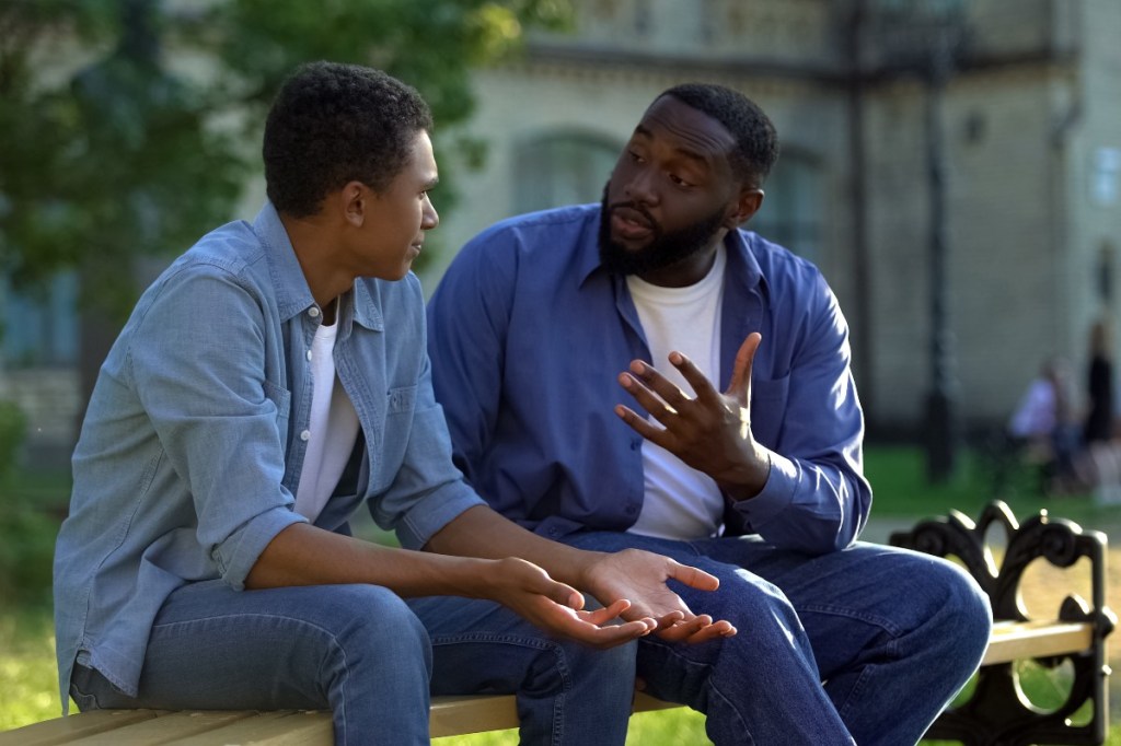 A father and son talking