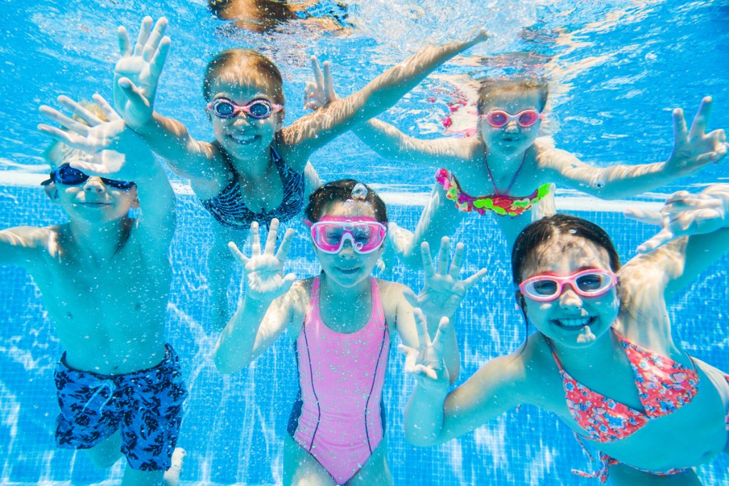 Kids playing games in a pool.