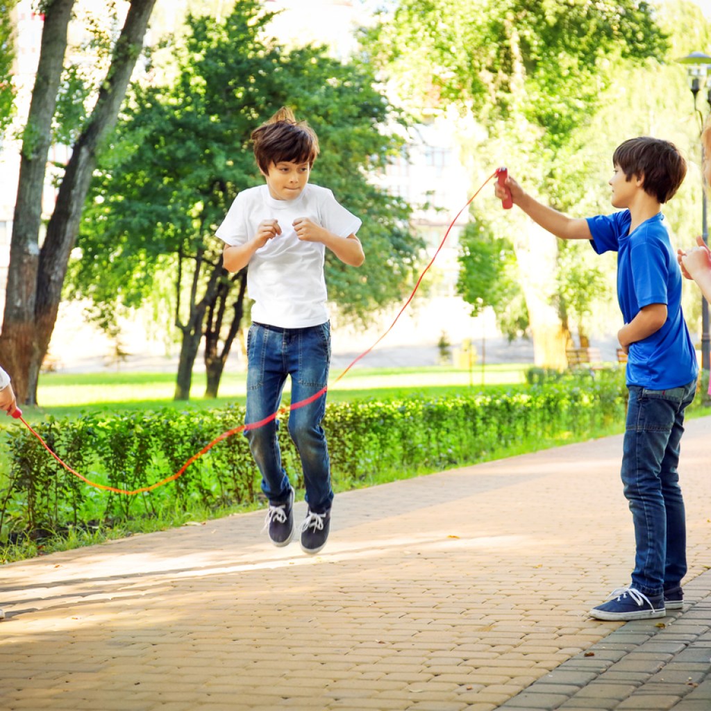 Kids having fun jumping rope