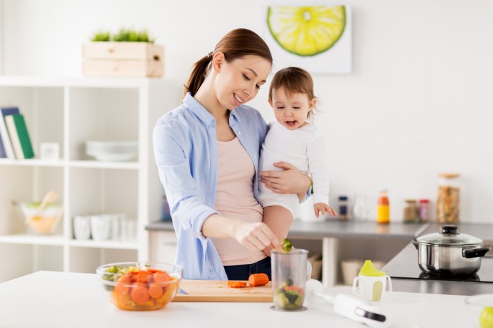 Mom with child preparing a meal in the kitchen