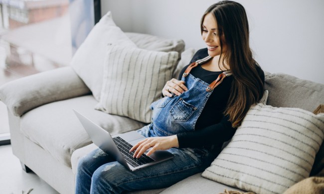 Pregnant woman on a computer