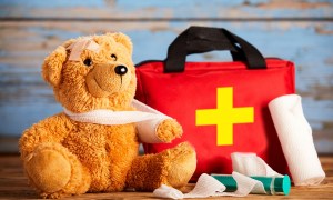 A teddy bear and first-aid kit