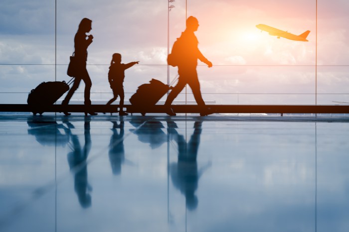 A family walking in an airport
