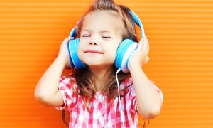 Preschooler wearing headphones