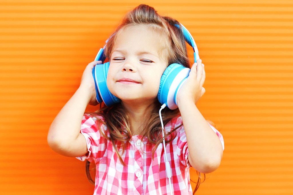 Preschooler wearing headphones