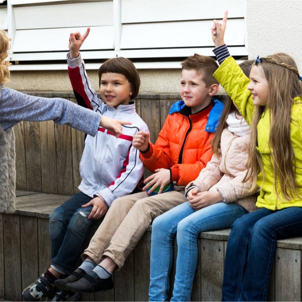 kids having fun playing an improv game outside
