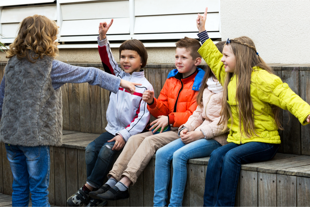 kids having fun playing an improv game outside