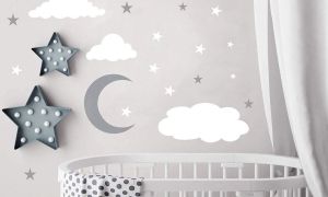 A nursery with moon and stars decorations.