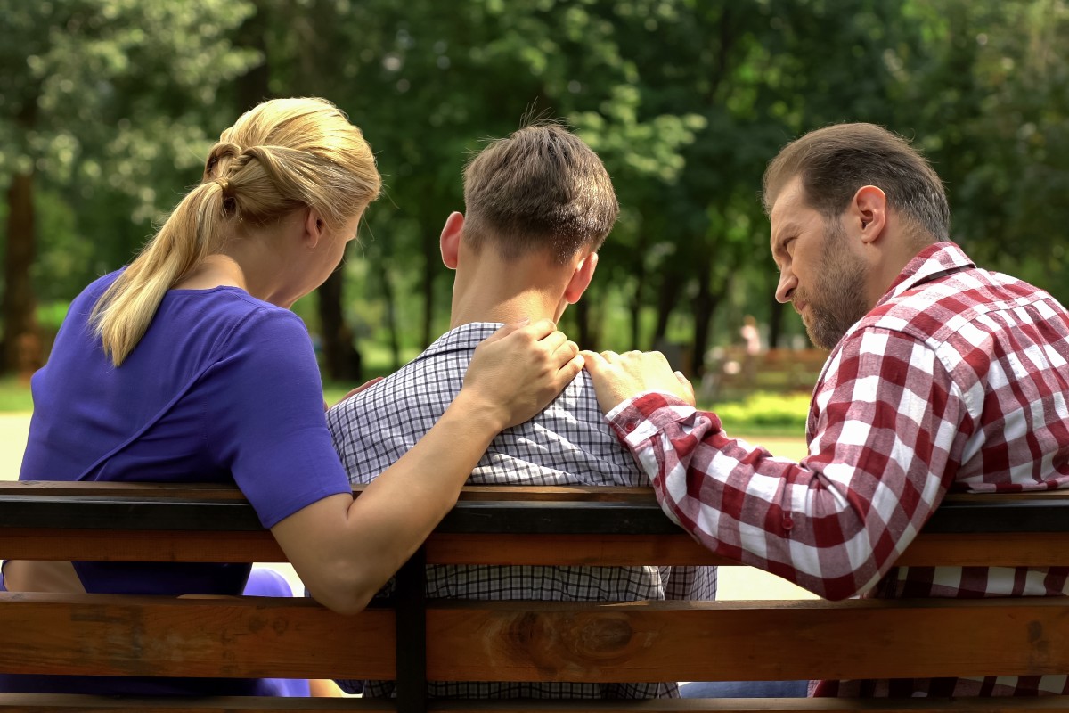 parents talking to teenager