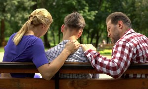 Parents talking to teenager