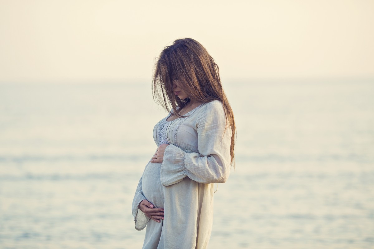 pregnant woman on beach