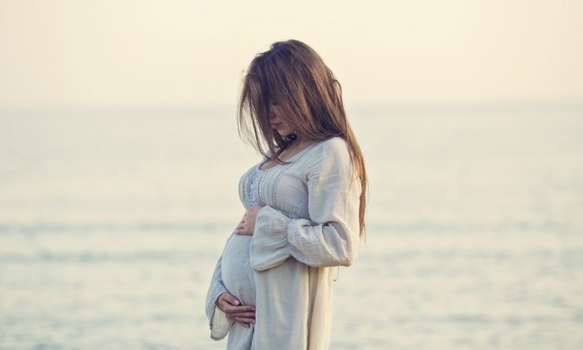 Pregnant woman on a beach