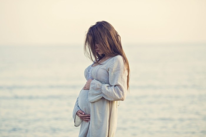 Pregnant woman on a beach