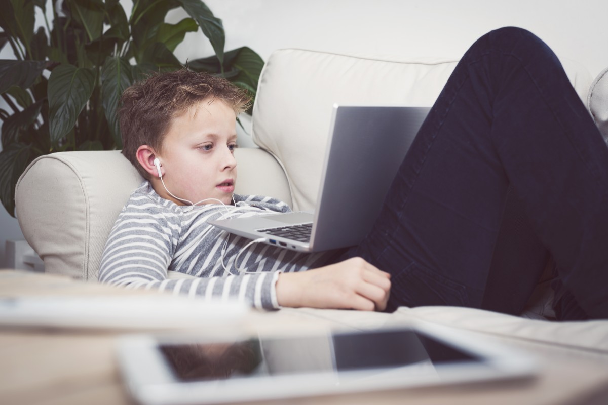 Teen streaming on his computer