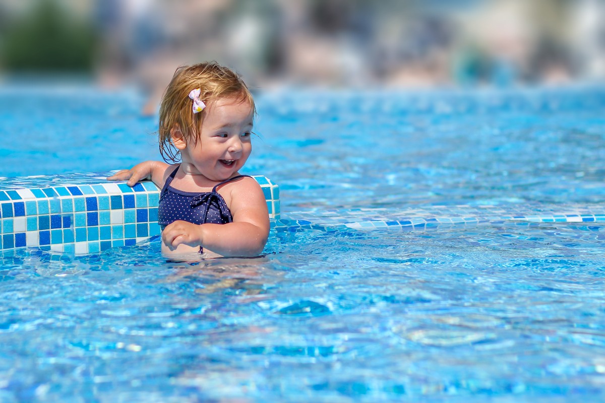 Toddler in swimming pool