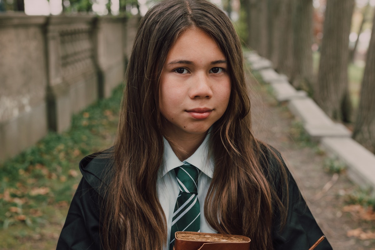 Tween girl in a Harry Potter costume