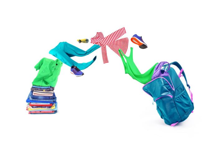 school clothes cost clothing flying out of bookbag
