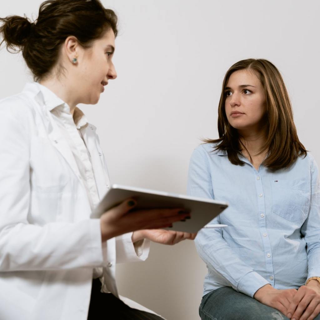 obstetrician talking with patient
