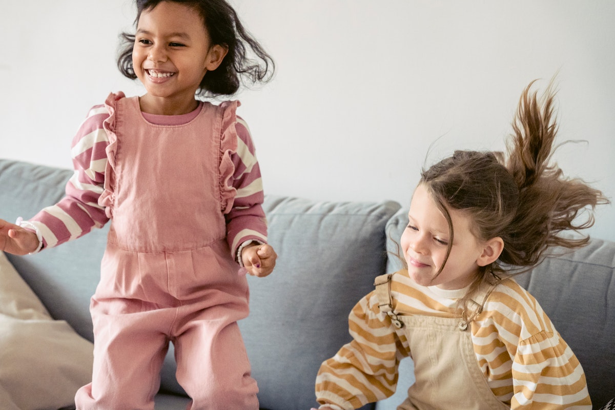 happy preschoolers jumping on an animal walk