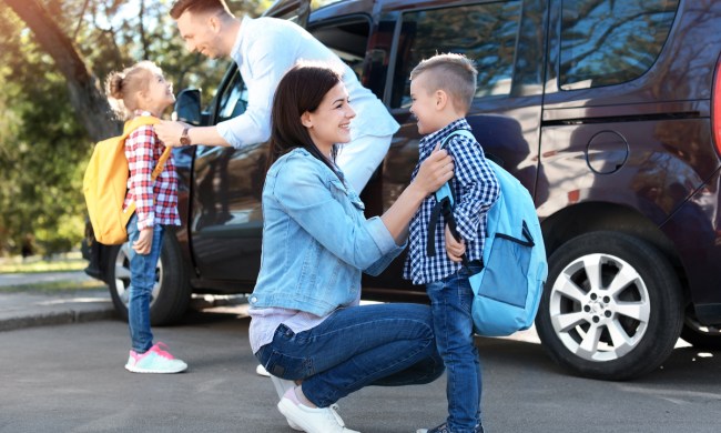 Parents getting their kids ready for a day of school.