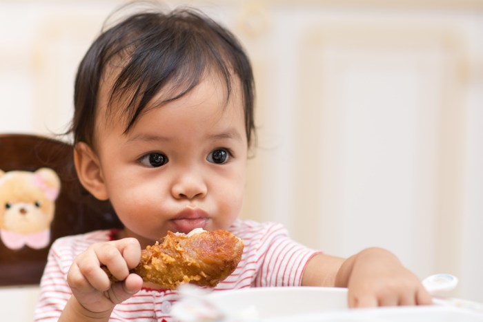 introducing meat baby asain eating fried chicken