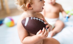 Babies in diapers playing