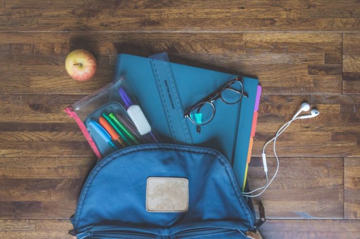 blue backpack with school supplies