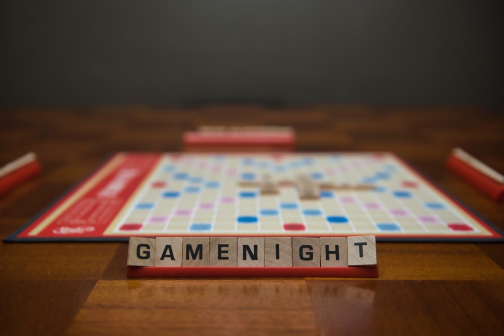 Scrabble tiles spelling, game night