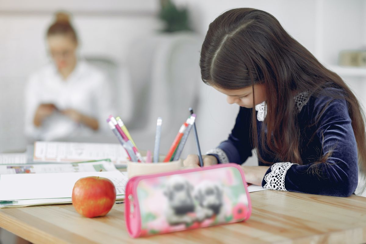 Girl In School With Pencil Case